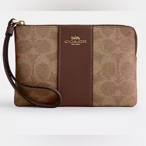 Coach Corner Zip Wristlet In Signature Canvas With Stripe